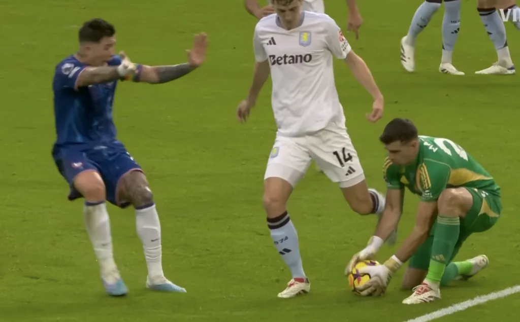 Goalkeeper picks up the ball after a back pass in Chelsea vs Aston Villa